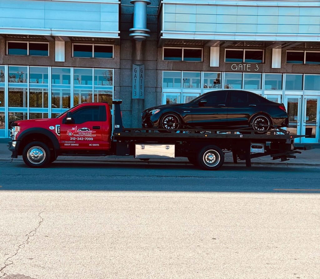 Efficient flatbed tow truck service in Gold Coast, Chicago, offering safe and secure transportation for vehicles, including cars, trucks, and motorcycles, with expert handling.