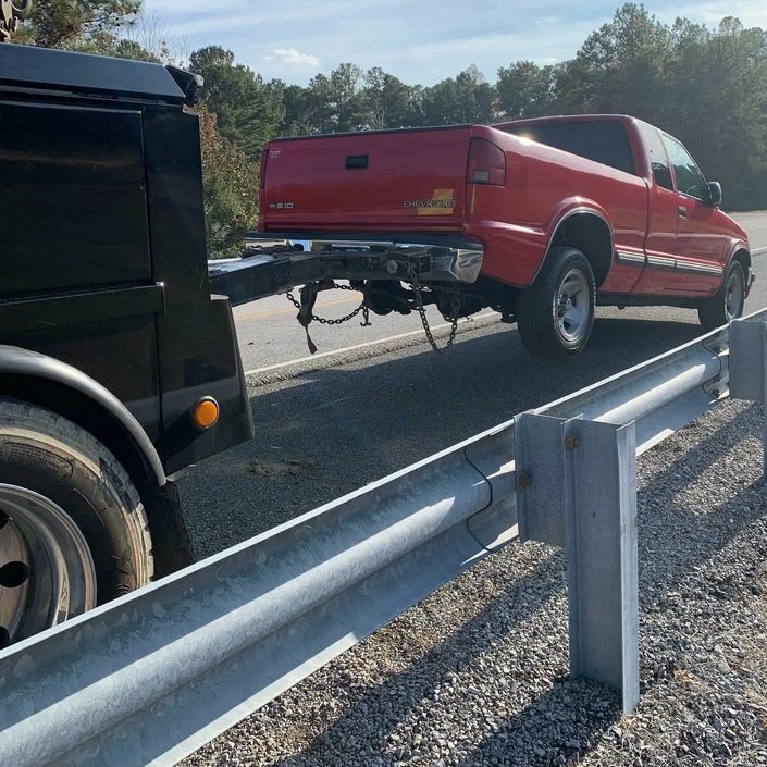 Reliable and secure flatbed towing service in Gold Coast, Chicago, ensuring safe, damage-free vehicle transport for all types of cars, trucks, and motorcycles.